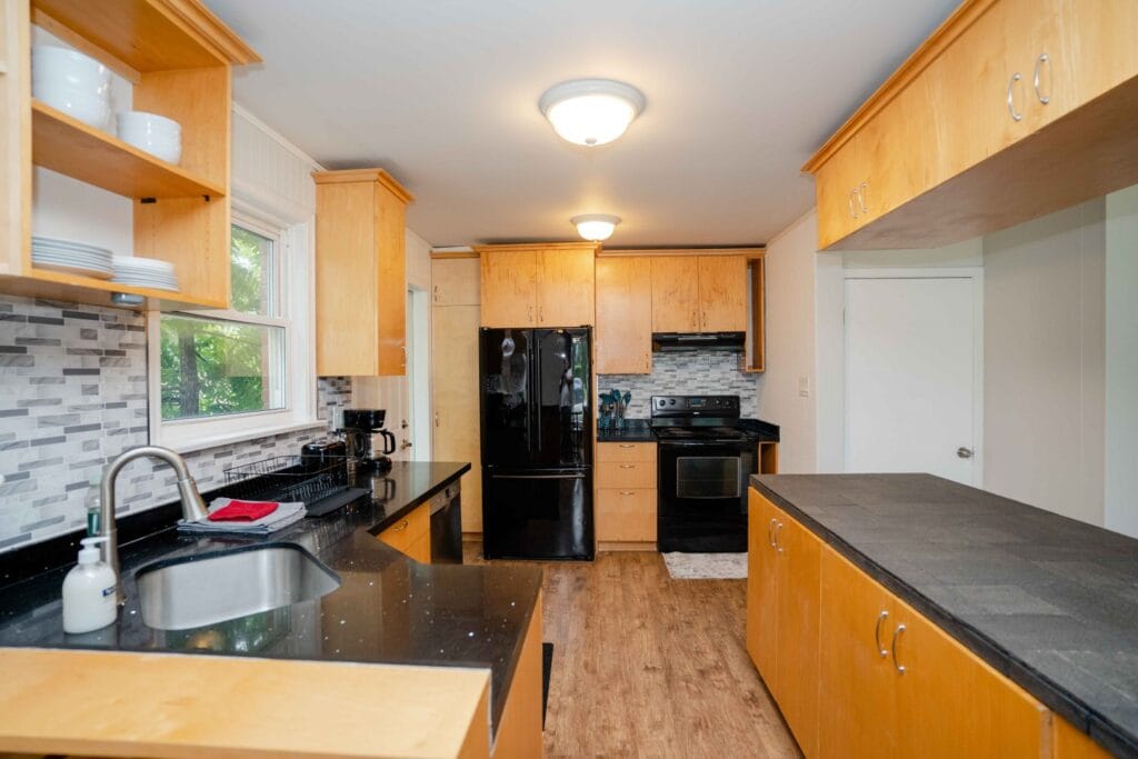 ENSŌ Listing 24 Gentry Cres, Richmond Hill Full kitchen in the lower unit with modern cabinetry